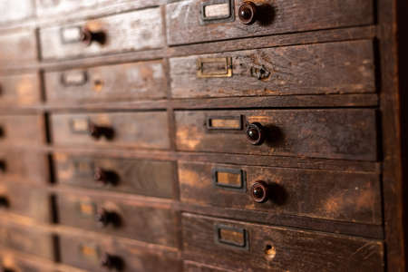 old wooden vintage cabinet, closeup image indoorの写真素材
