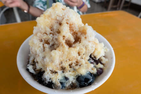 Taiwanese traditional shave ice with mesona black herbal teaの写真素材