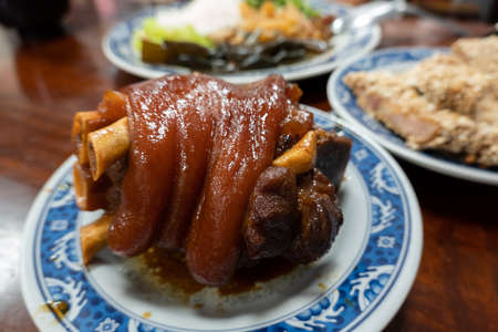 taiwanese braised pork feet, traditional food in a restaurantの写真素材