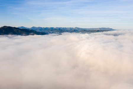 aerial view of Puli cityscape with clouds over the city, Nantou county, Taiwanの写真素材
