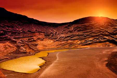 Amazing sunset in Charco Verde, Lanzarote  Canary Islands の写真素材