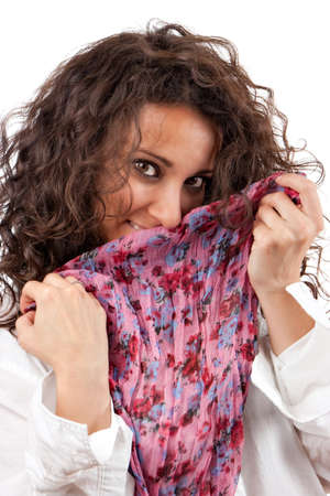 Young girl with pink scarf on white backgroundの写真素材