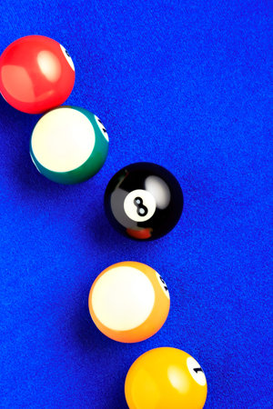 Different points of view billiard balls on a blue pool table.