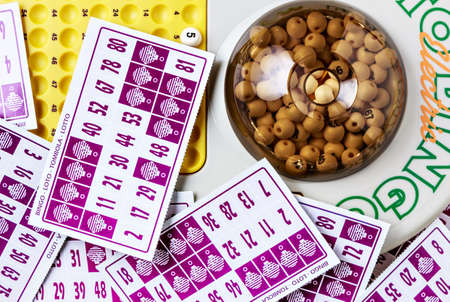 Electronic bingo game with cards to play. Horizontal image viewed from above.の写真素材