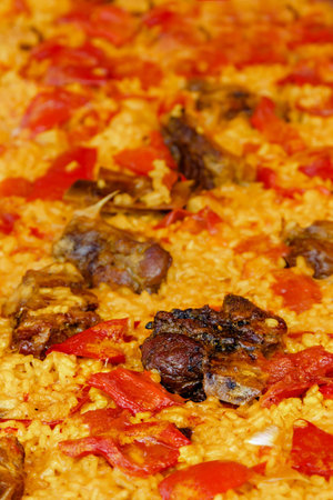 Chicken paella on a traditional market.Vertical image.の写真素材