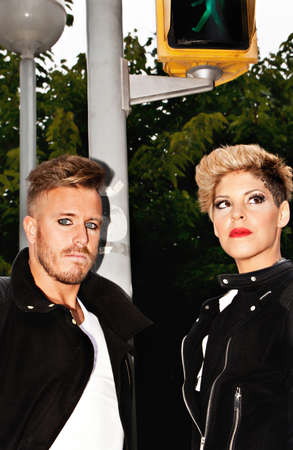 Fashion young couple in the middle of the street. Urban fashion photography. Vertical image.の写真素材