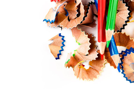 Color shavings pencils with pencils color viewed from above. Horizontal image.