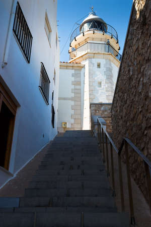 Lighthouse seen from below. Vertical image.の写真素材