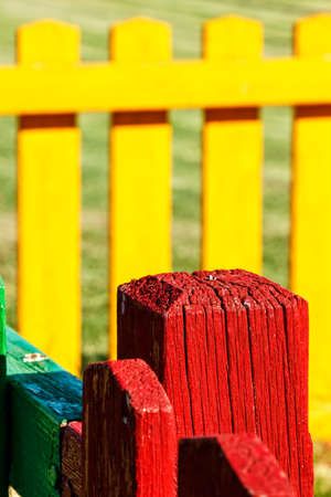 Red wooden post close up of a playground. Vertical image.の写真素材