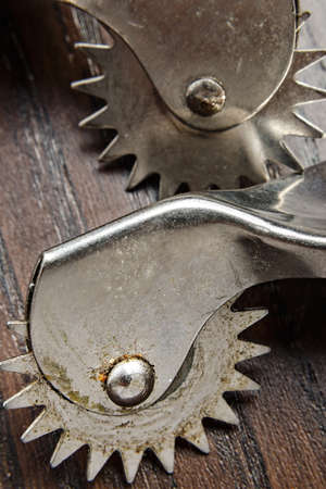 Roulette marks tailor patterns with rust and close up.の写真素材