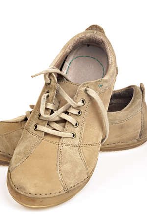 Casual brown shoes on white background. Urban fashion.の写真素材