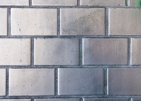 Silver painted brickwallの写真素材