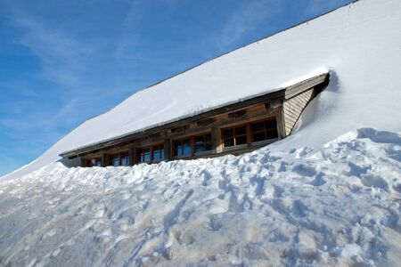 House covered by snow in the Black Forestのeditorial素材