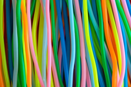 A background from colourful toy cablesの写真素材
