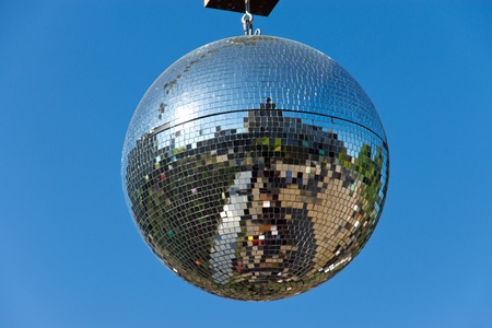 Disco ball with blue skyの写真素材