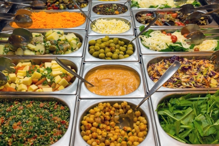 Salad buffet in a restaurantの写真素材