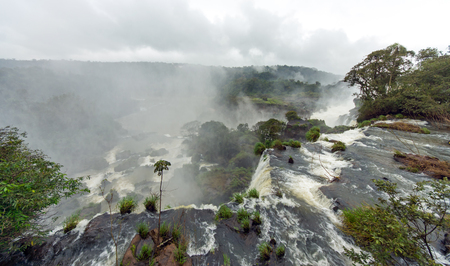 Mist over the Iguazu falls in South Americaの写真素材