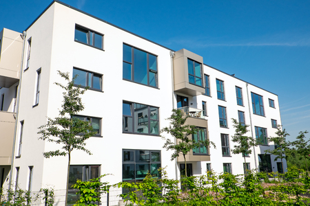 Modern white apartment houseの写真素材