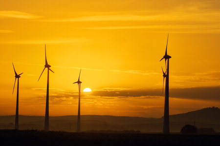 Wind Wheels and a beautiful sunset seen in rural Germany