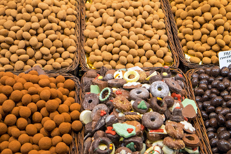 Chocolate and other candies at the Boqueria market in Barcelonaの写真素材