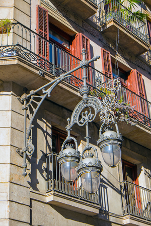 Old fashioned street light seen in Barcelonaの写真素材