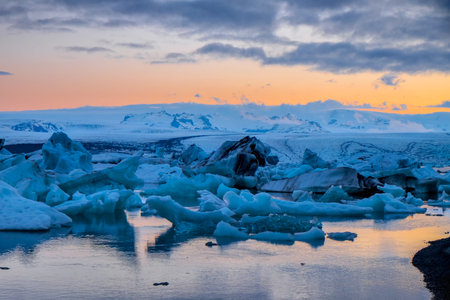 The Jokulsarlon glacier lagoon in Iceland at midnight in summer