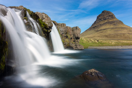 The Kirkjufellsfoss with Mount Kirkjufell in Iceland