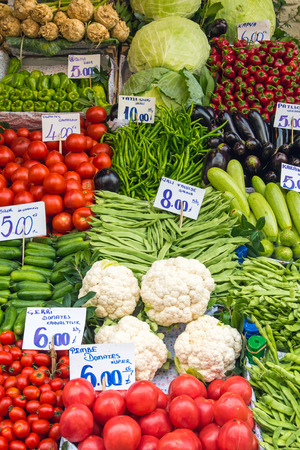 Vegetables and salad for sale at a marketの写真素材