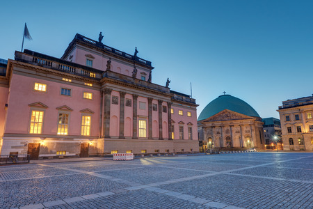 The Berlin State Opera and St. Hedwig's Cathedral at dawnの写真素材