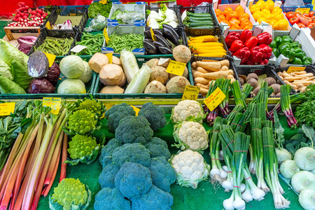 Great choice of fresh vegetables for sale at the Viktualienmarkt in Munich, Germanyの写真素材
