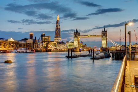 View of the Thames river in London after sunset with the Bridge and the Shard in the backのeditorial素材