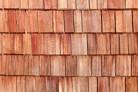 Background from a traditional wall made of wooden shingles, lake in Bavaria, Germanyの写真素材
