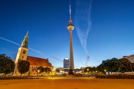 The famous Alexanderplatz in Berlin with the Marienirche and the Television Tower at dawnのeditorial素材