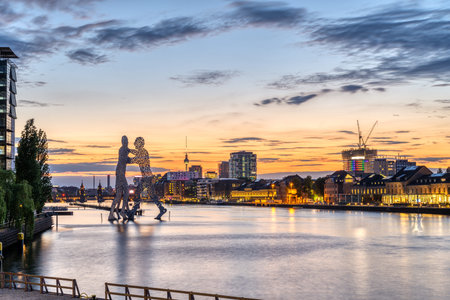The river Spree in Berlin with the famous TV Tower in the distance after sunset