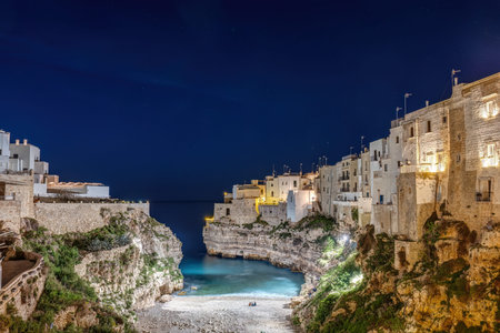 The Lama Monachile Bay in Polignano a Mare in Puglia, Italy, at night