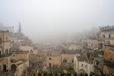 The old town of Matera in Italy on a misty dayの写真素材