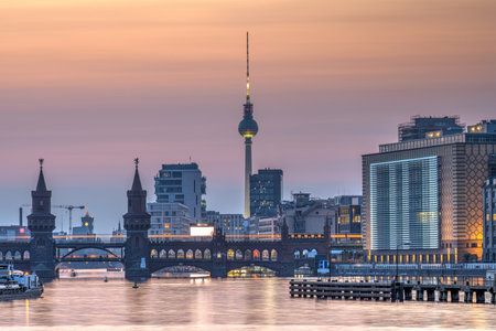 Berlin with the river Spree after sunset with the Oberbaum Bridge and the famous Television Towerの写真素材