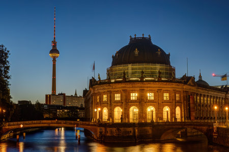 The Bode Museum in Berlin at dawn with the famous TV Tower in the backの写真素材