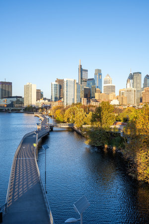 The skyline of downtown Philadelphia with the Schuylkill river in the evening sunlightの写真素材
