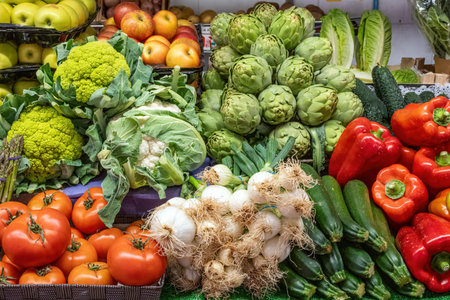 Different kinds of vegetables for sale at a marketの写真素材