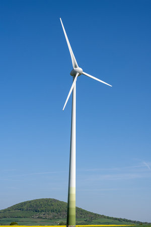 Modern wind turbine in a rural landscape in Germanyの写真素材