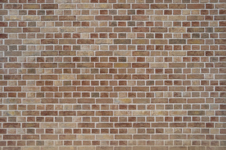 Background from a wall made of brown clinker bricksの写真素材