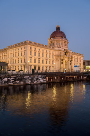The reconstructed city palace in Berlin at nightの写真素材