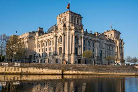 The imposing Reichstag, the German parliament building, at the river Spree in Berlinの写真素材