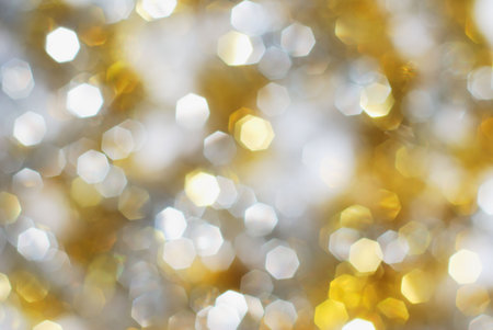 Silver and gold christmas lights backgroundの写真素材