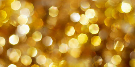 Bright golden Christmas lights backgroundの写真素材