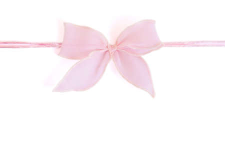 Pink bow isolated on white backgroundの写真素材