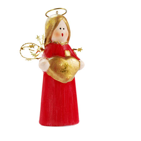 Red and golden Christmas angel isolated over white backgroundの写真素材