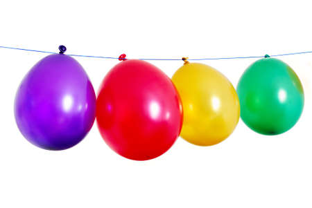 Fou rcolorful balloons in a line on white backgroundの写真素材