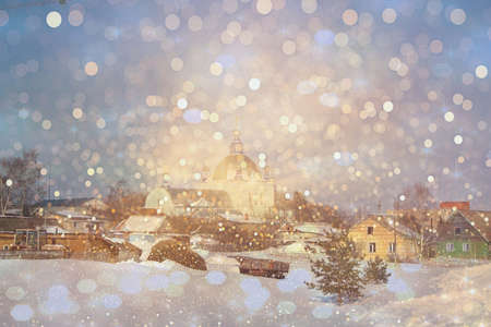 Christmas in the village in the open air for a postcardの写真素材